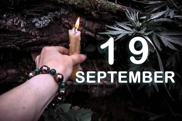 Calendar date on the background of an esoteric spiritual ritual September 19 is the twentysecond day of the month