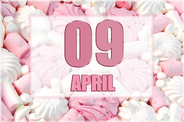 Calendar date on the background of white and pink marshmallows April 9 is the ninth day of the month