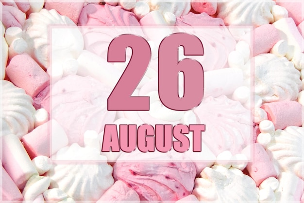 Photo calendar date on the background of white and pink marshmallows august 26 is the twentysixth day of the month