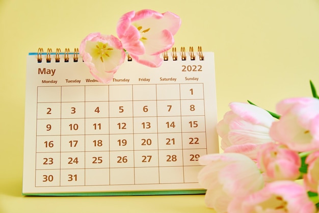 Calendar and flowers close up