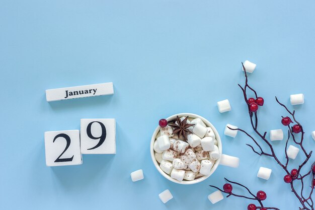 Calendar January 29 Cup of cocoa, marshmallows and branch berries