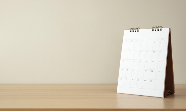 Calendar page close up on wood table