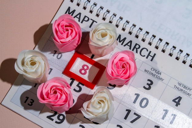 Calendar page on march 8 of International Women's Day with rosebud