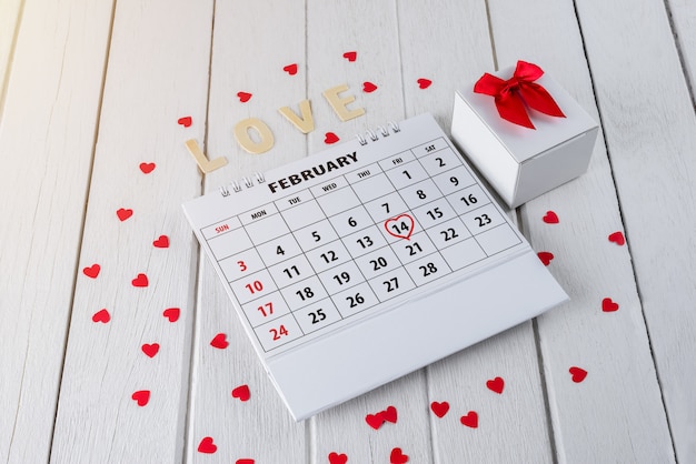 Calendar page with a red hand written heart highlight on February 14 of Saint Valentines day