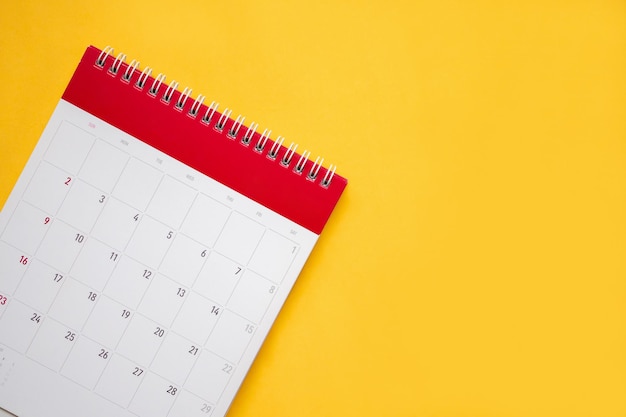 calendar page on yellow background business planning appointment meeting concept