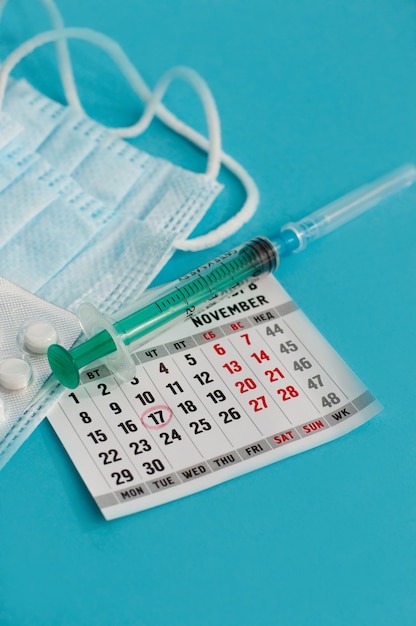 Calendar sheet on the background of medical products