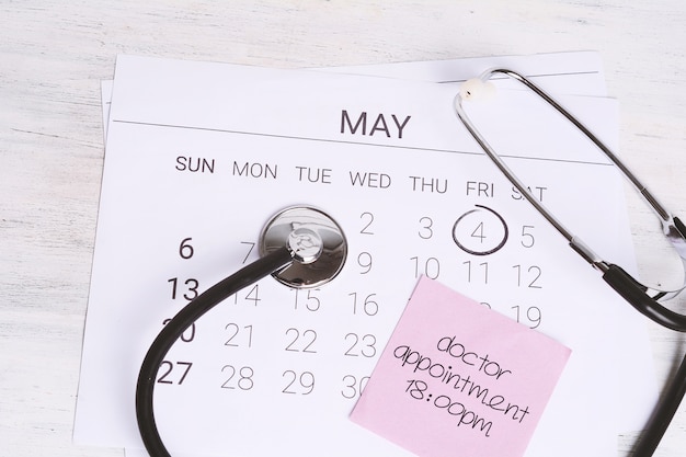 Calendar and stethoscope.