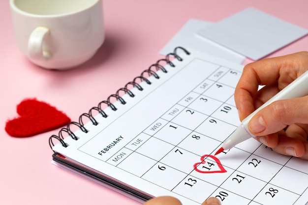 Photo calendar with date marked valentine's day.