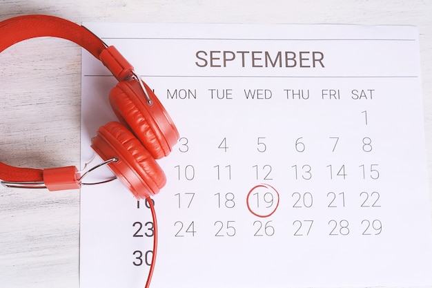 Calendar with headphones. 