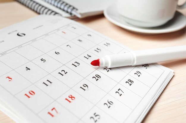 Calendar on wooden table