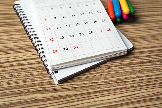 Calendar on wooden table