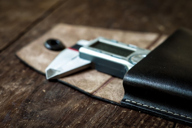 Photo caliper in leather case