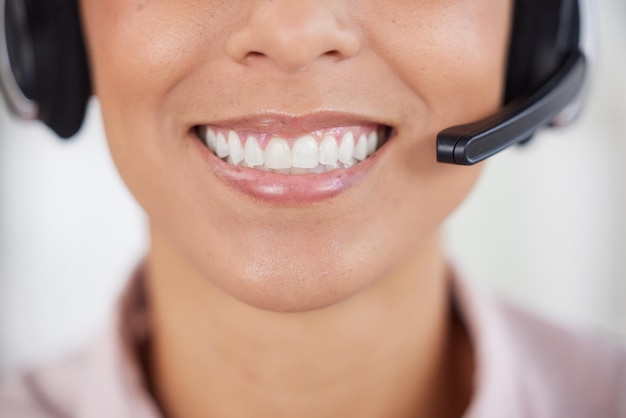 Call center customer service and mouth with a black woman consultant working in telemarketing or sales Contact us teeth and headset with a female consulting in an office for crm support or help