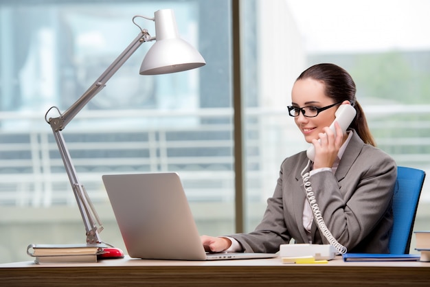 Call center operator working at her desk