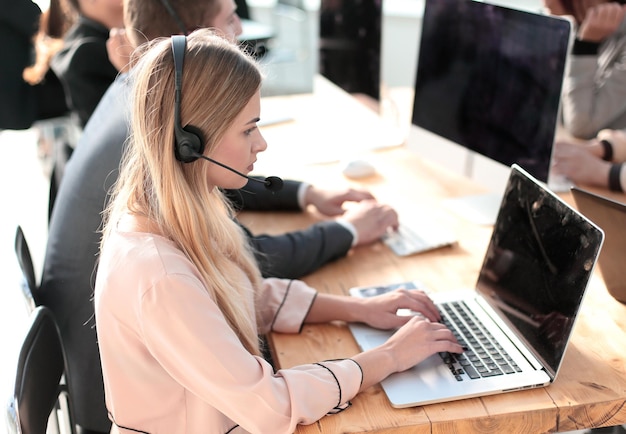 Call center operators using computers in the workplace