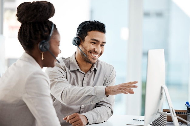 Call center training and computer with business people in office for coaching customer service and communication Help desk contact us and mentor with man and black woman for sales and teamwork