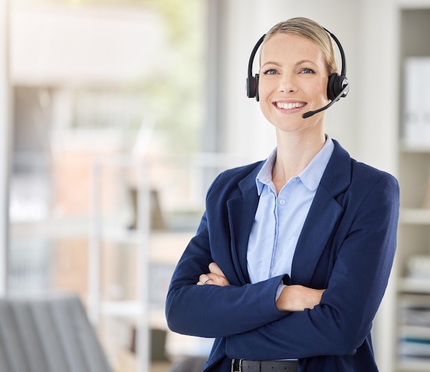 Call center woman and success manager smile with headset on telemarketing and support call at office Customer service consultant crm agent or employee consulting or helping with contact us question