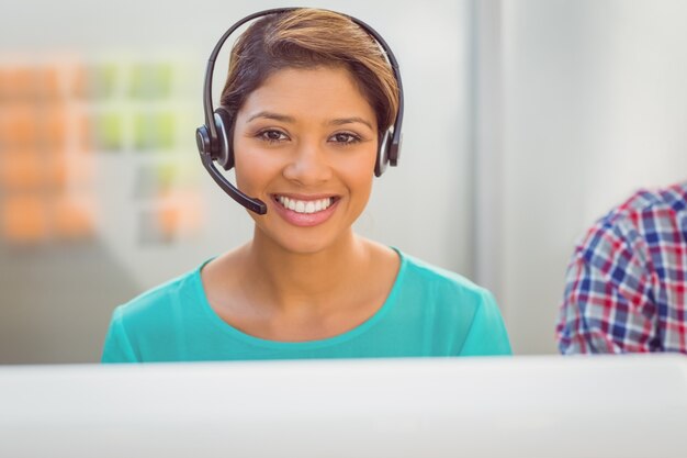 Photo call centre representative using headset