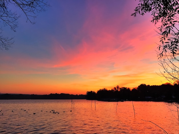 calm lake against scenic sky