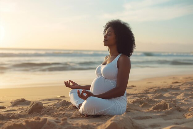 Calm pregnant African American woman meditating outdoors on ocean beach