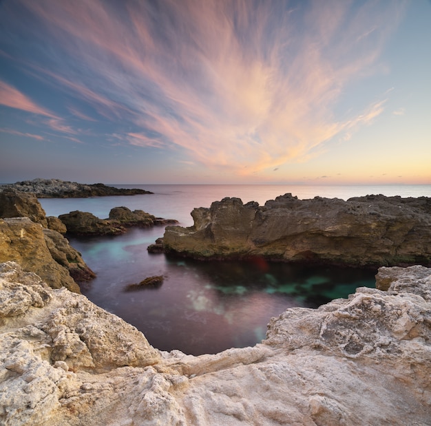 Calm sea at sunset.