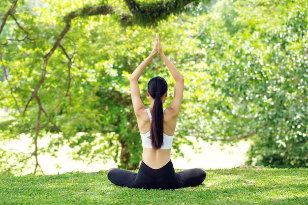 Calmness and relax.healthy woman yoga lifestyle balanced practicing meditation and zen energy exercise sport yoga outdoors. Healthy life Concept.