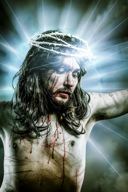 calvary jesus, man bleeding, representation of passion with blue light halo