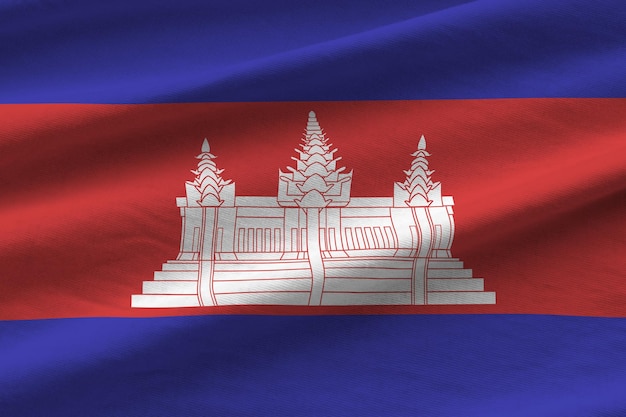 Cambodia flag with big folds waving close up under the studio light indoors The official symbols and colors in banner