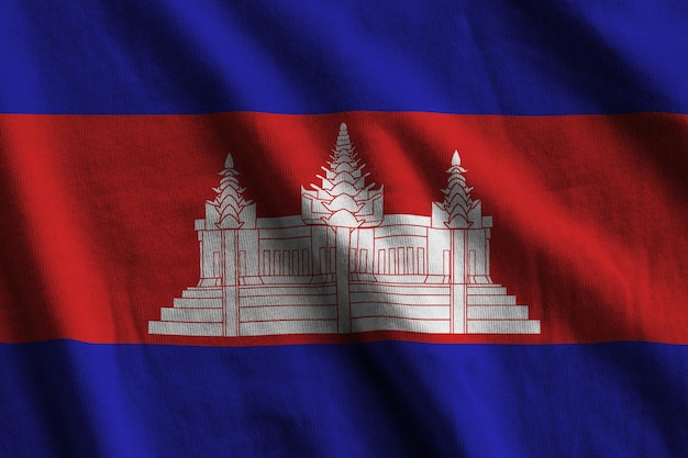 Cambodia flag with big folds waving close up under the studio light indoors The official symbols and colors in banner