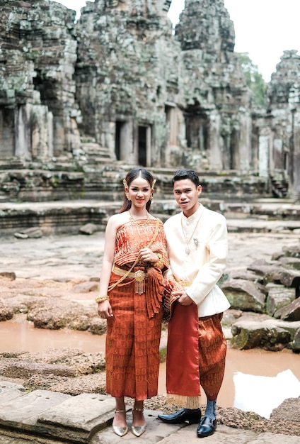 Cambodian wedding in Angkor Wat wearing the national outfits