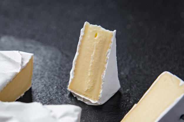 camembert or brie cheese head of soft cheese healthy meal food diet snack on the table