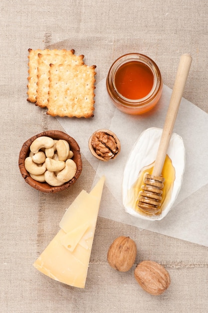 Camembert and parmesan cheese honey and nuts