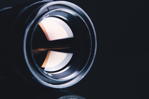 Camera lens on dark background