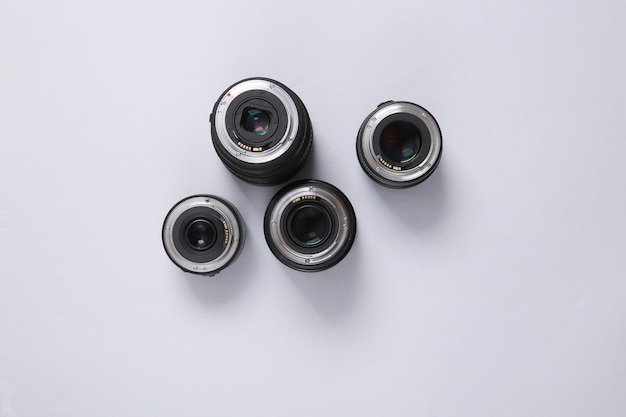 Camera lens on gray background