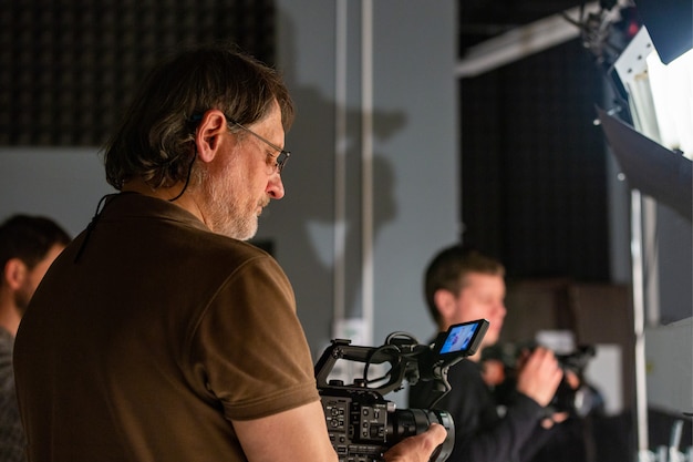 Camera operator working with a cinema camera