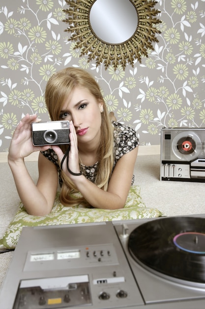 Photo camera retro photo woman in vintage room