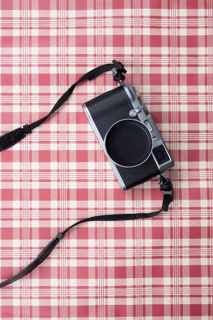 The camera on a vintage  texture background