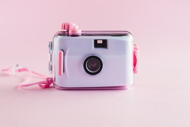 Camera waterproof toy on pink background