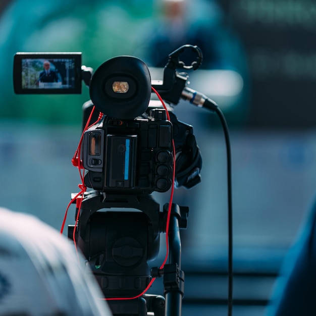 Foto cameraman opname evenement op media persconferentie