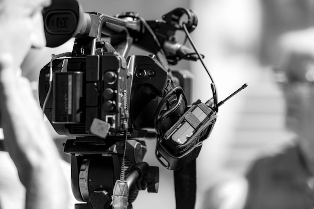 Photo cameras at a media conference outdoors