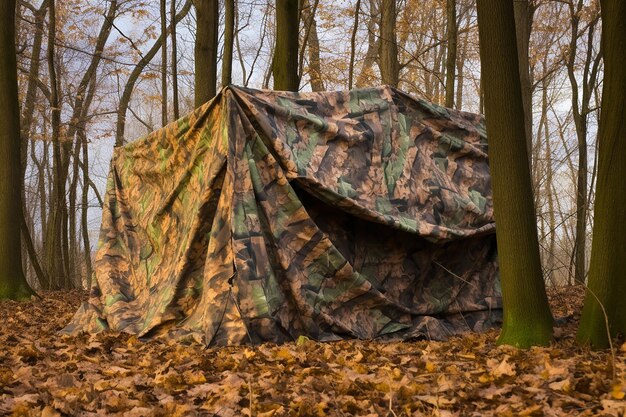 Photo camouflaged woodland hunting blind scene