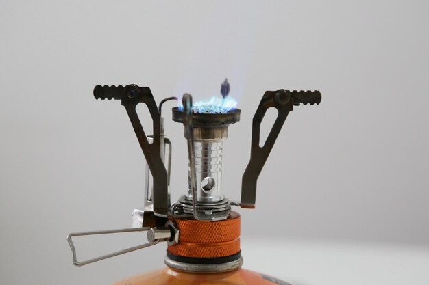 Camp stove with high flame in blue color