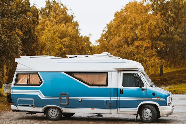 camper van in a beautiful forest scene