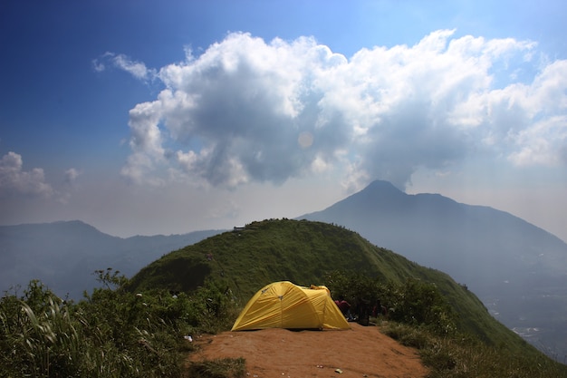 Campground at green hills and blue sky