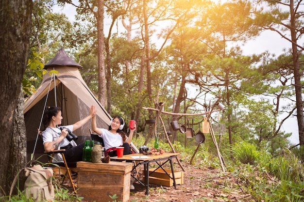 Camping concept Group of diverse friends enjoying summer party together