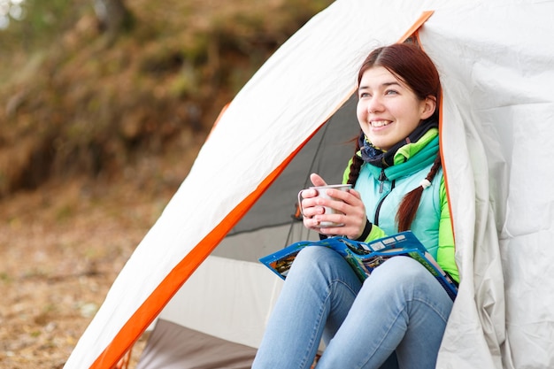 Camping happy woman