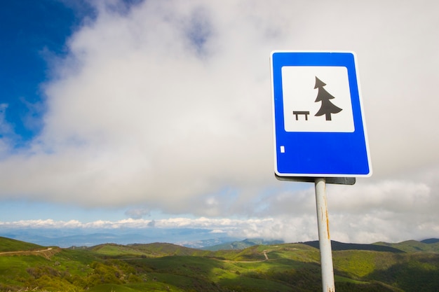 Camping road sign and mountain landscape in Georgia