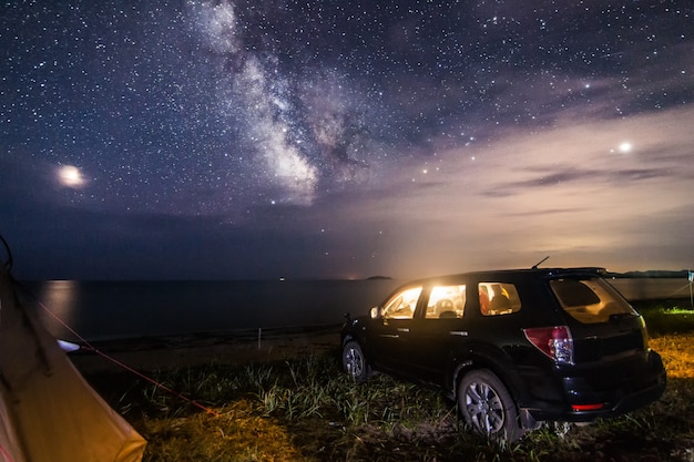 Camping at the sea beach under night sky