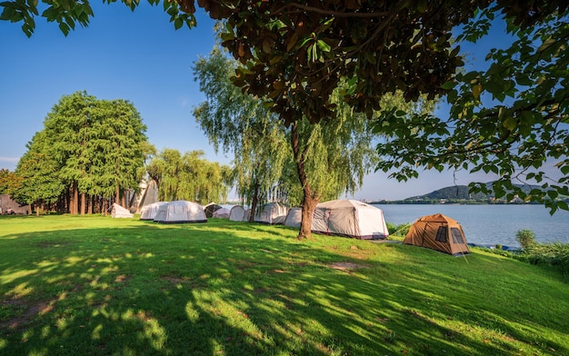 Camping tent on the grass in a sunny day