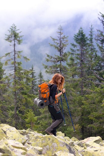 Camping trip. girl hiker at the  mountains. gorgany, Ukraine.